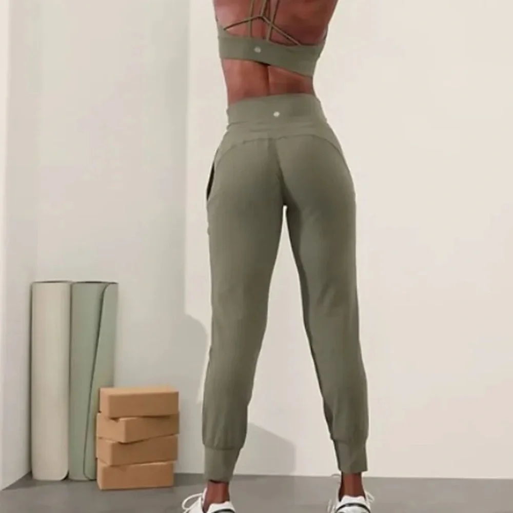 Athleta Women’s Moss Green Salutation Jogger Pants Size Small Tall ST Long - Picture 2 of 7